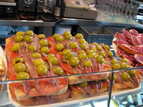 Olives and anchovies and tomatoes oh my